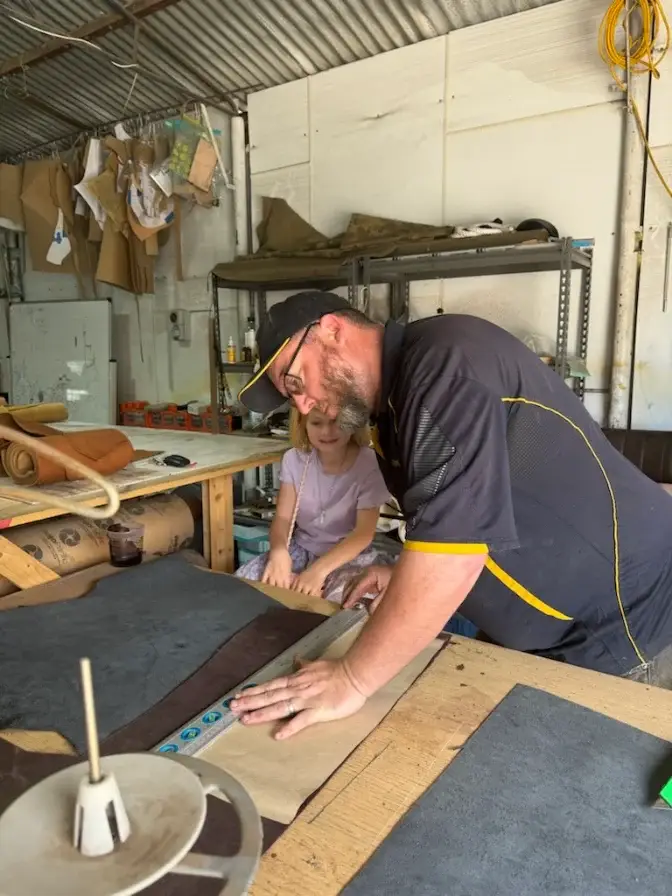 Rian at the forge at his knife-making business, Fallen Forge